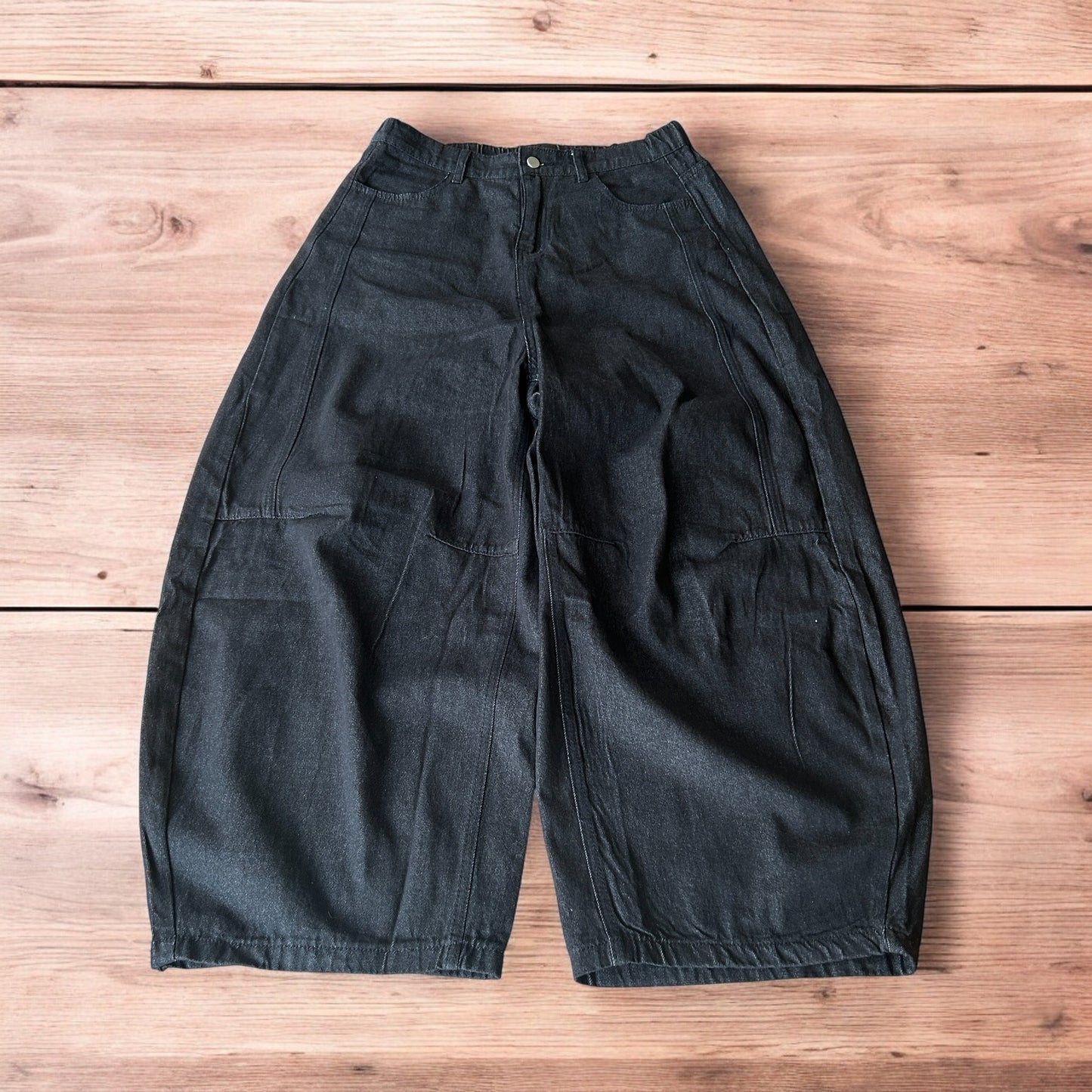 Super baggy raw denim style skater fit jeans in washed black.