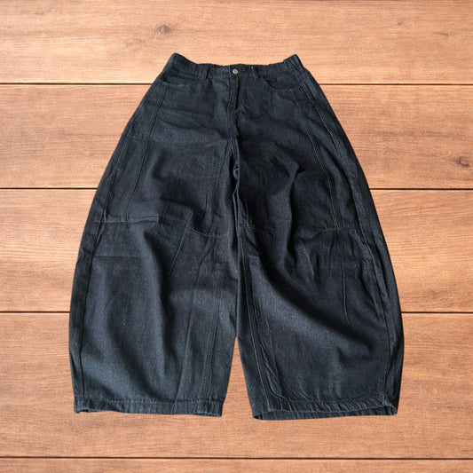 Super baggy raw denim style skater fit jeans in washed black.