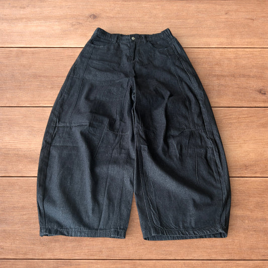 Super baggy raw denim style skater fit jeans in washed black.