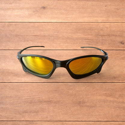 Insane polarised sunglasses in black with orange reflective lense.
