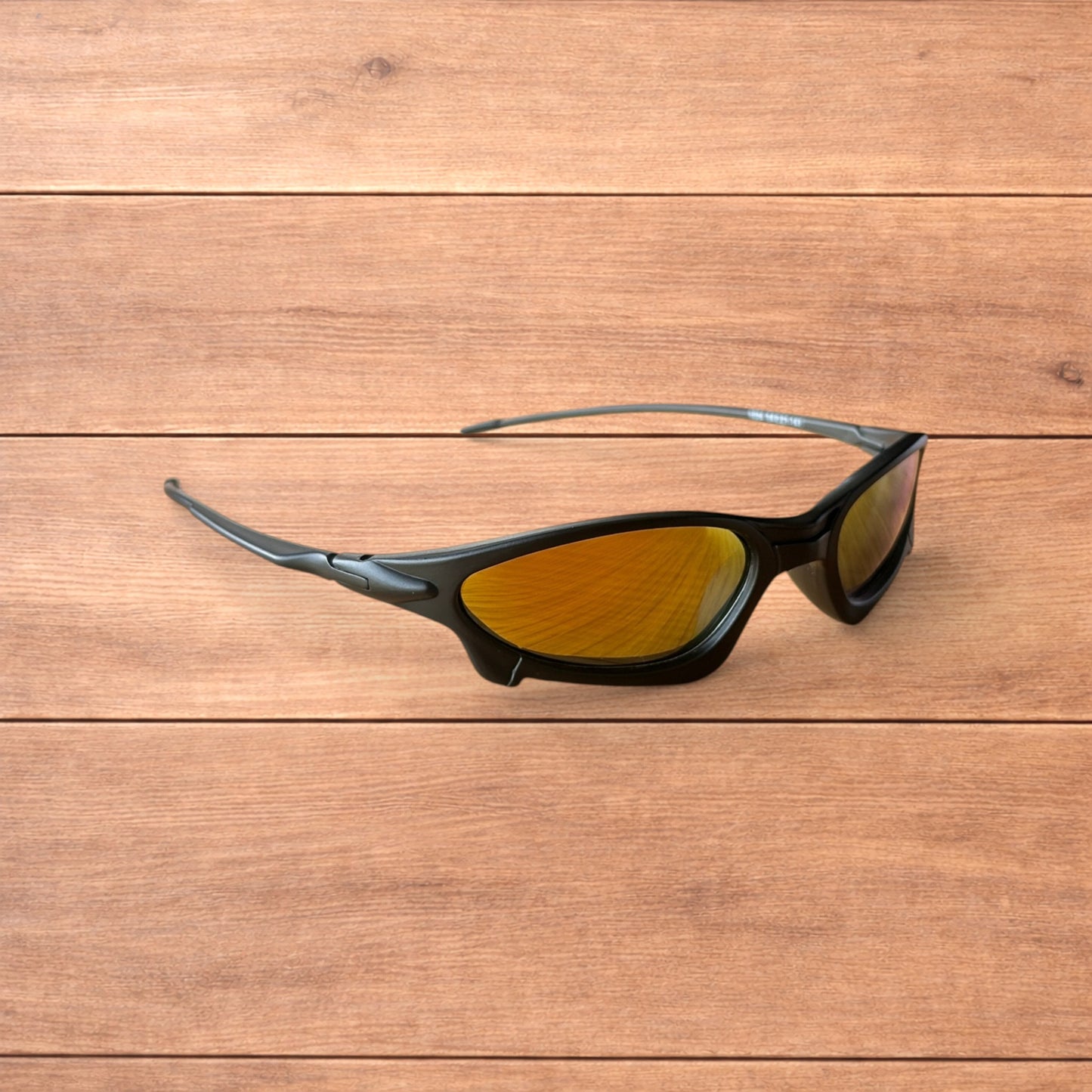 Insane polarised sunglasses in black with orange reflective lense.