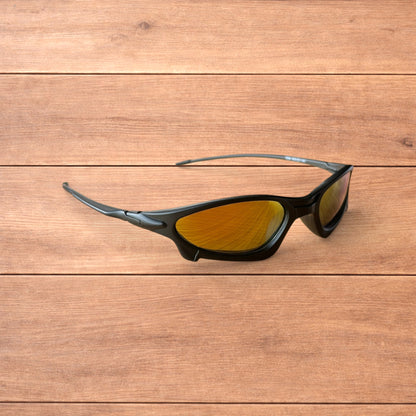 Insane polarised sunglasses in black with orange reflective lense.