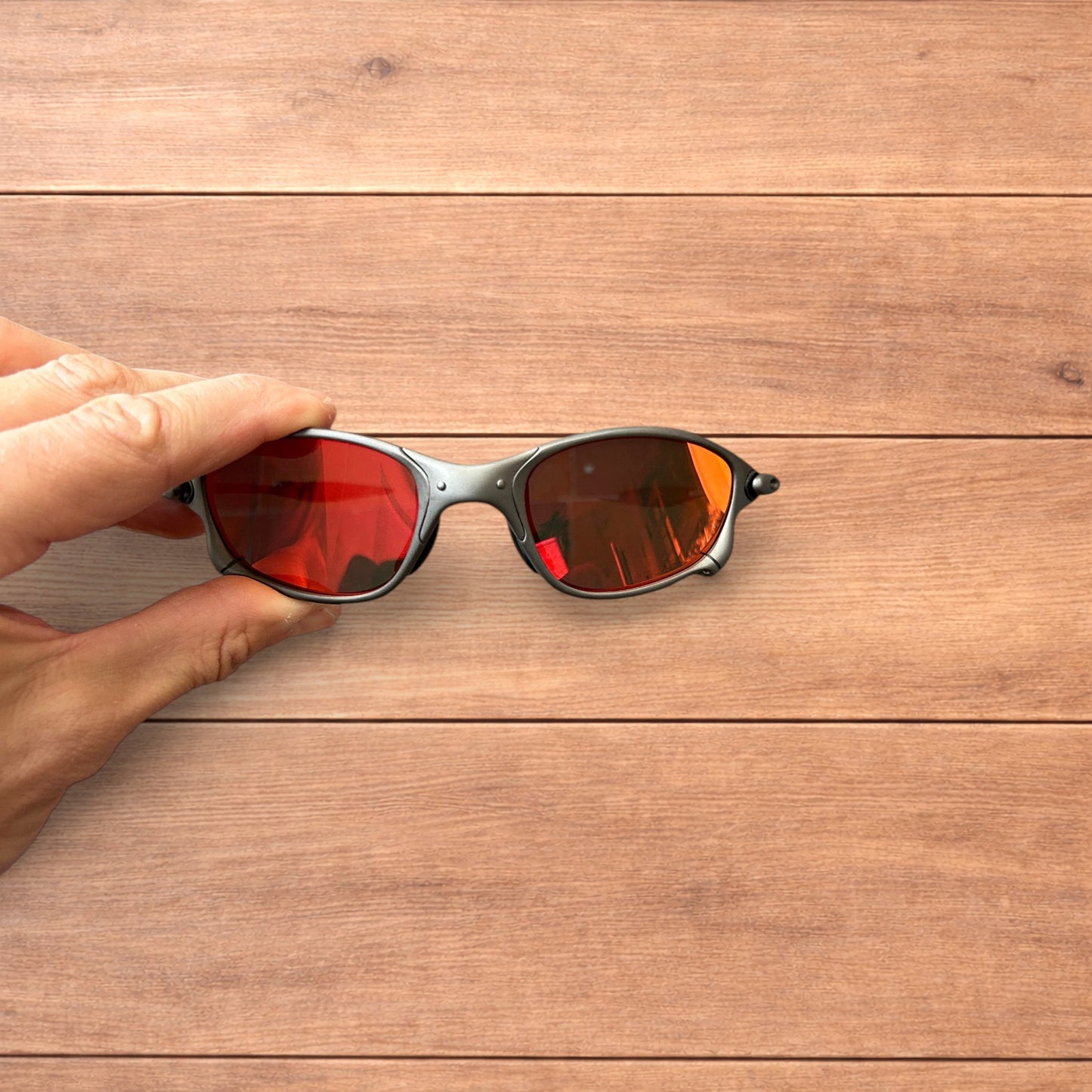 Insane metal frame polarised sunglasses in black frame red lense.