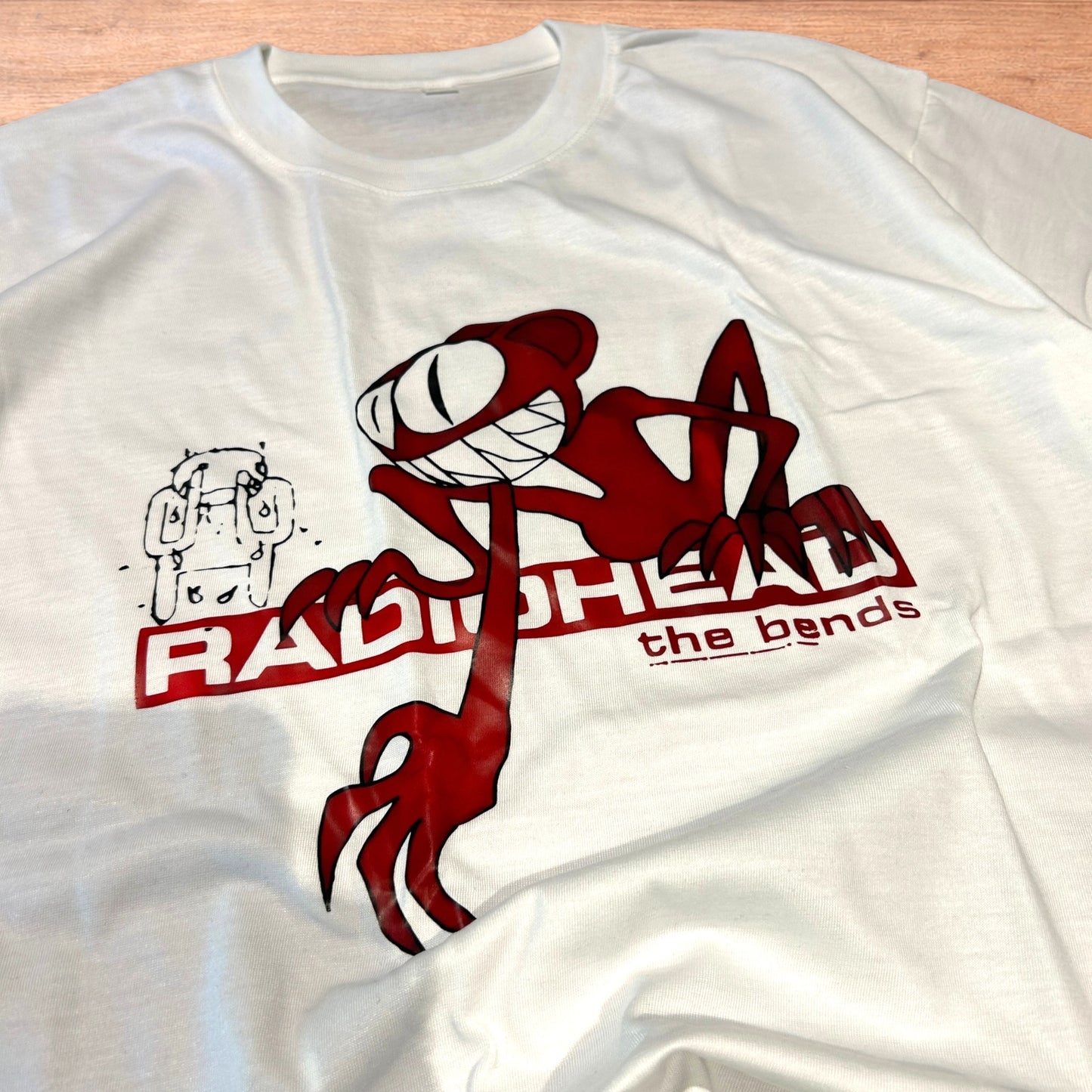 Radiohead the bends T-shirt with front graphic in white.