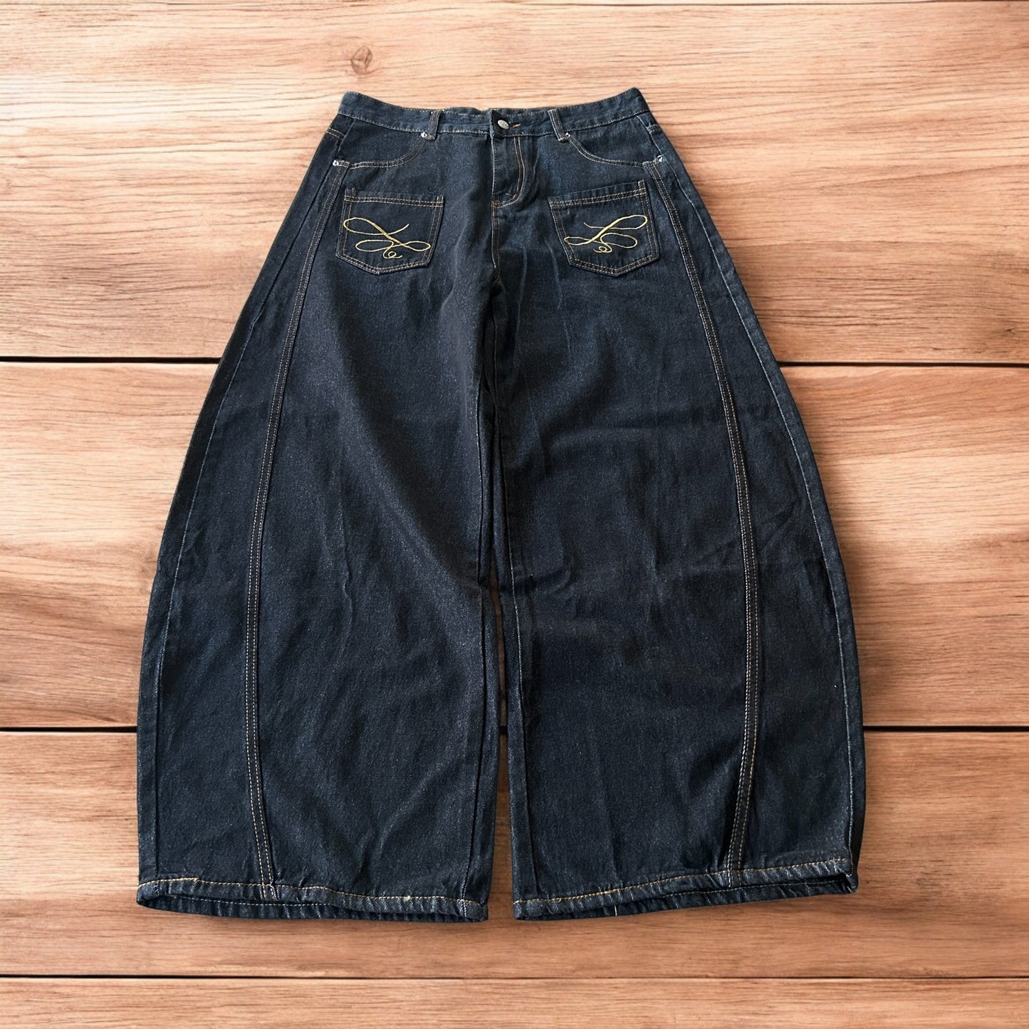 Vintage style baggy wide leg Korean fit jeans with embroidery in black.