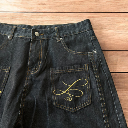 Vintage style baggy wide leg Korean fit jeans with embroidery in black.