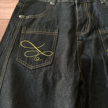 Vintage style baggy wide leg Korean fit jeans with embroidery in black.
