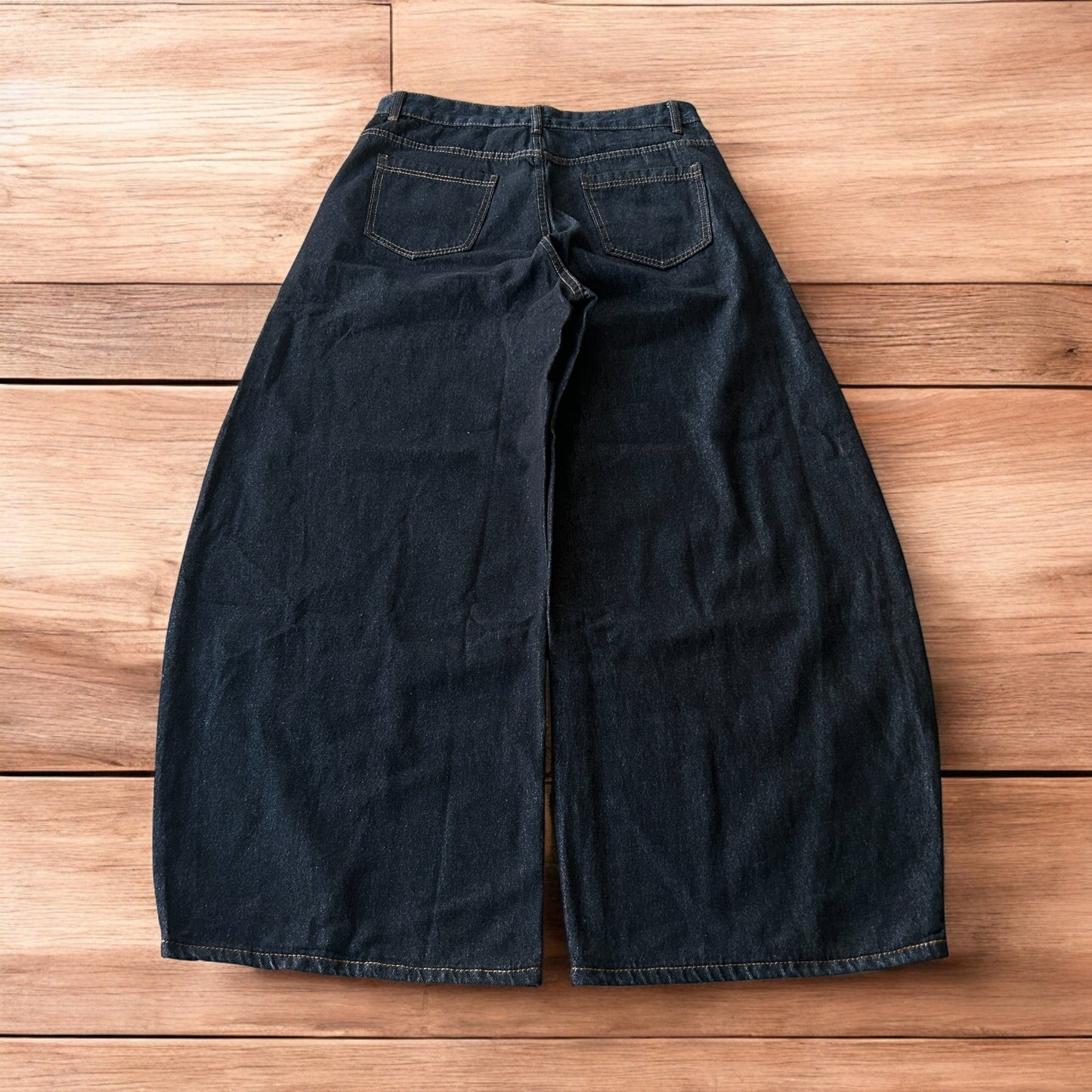 Vintage style baggy wide leg Korean fit jeans with embroidery in black.