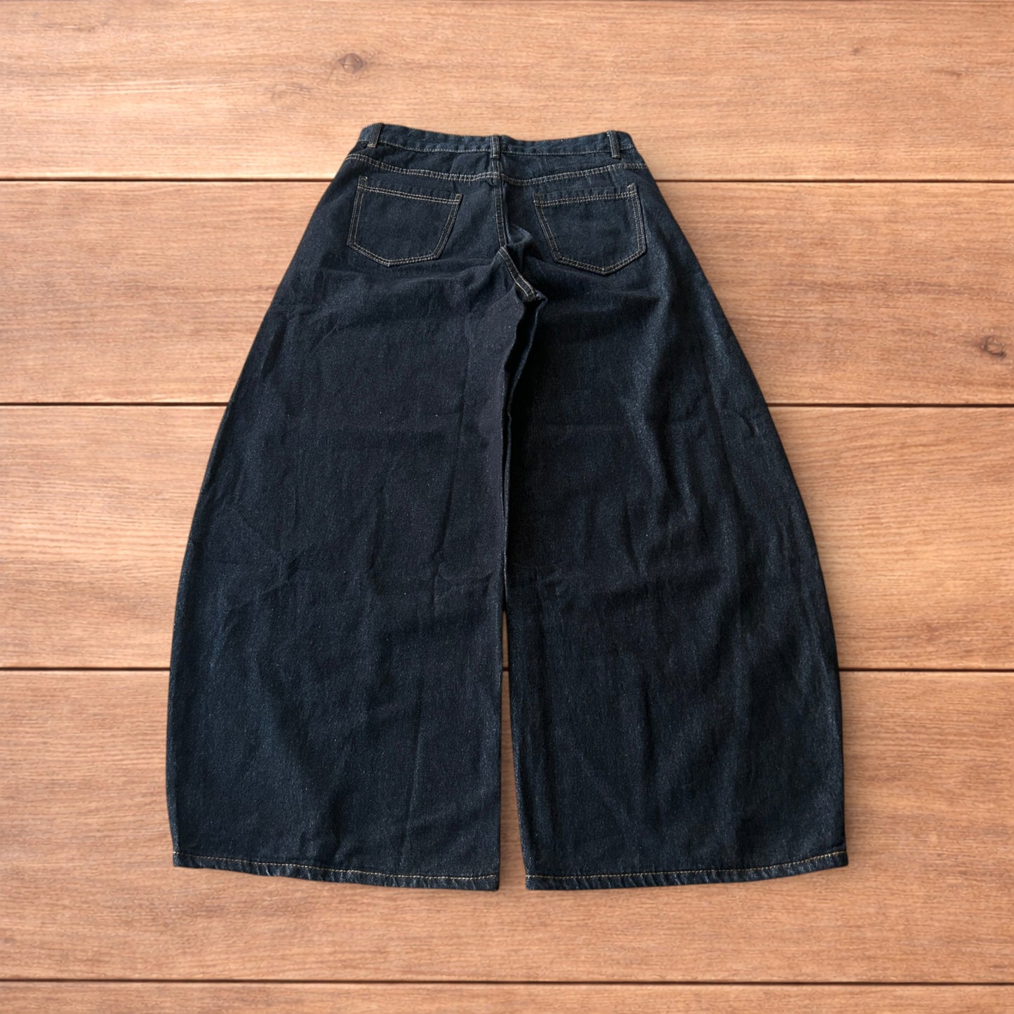 Vintage style baggy wide leg Korean fit jeans with embroidery in black.