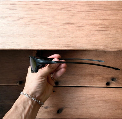 Insane polarised sunglasses in black with orange reflective lense. One size.