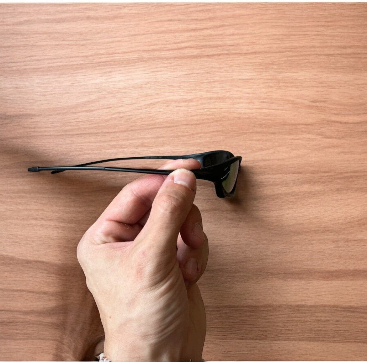 Insane polarised sunglasses in black with orange reflective lense. One size.