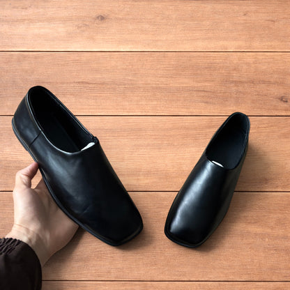 Lovely faux leather slip on loafers shoes in black.