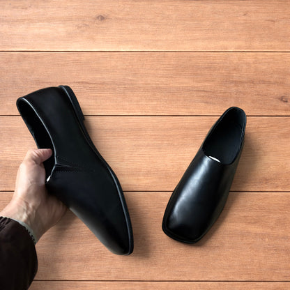 Lovely faux leather slip on loafers shoes in black.