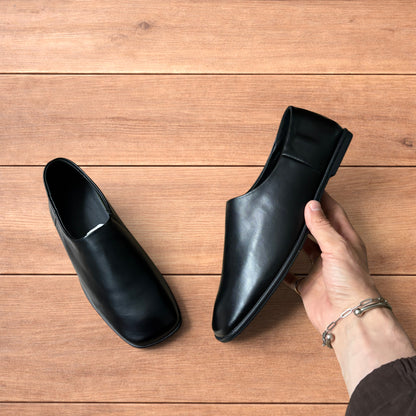 Lovely faux leather slip on loafers shoes in black.