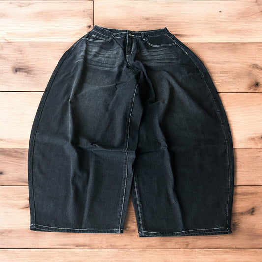 Super baggy wide leg balloon fit jeans in washed black.