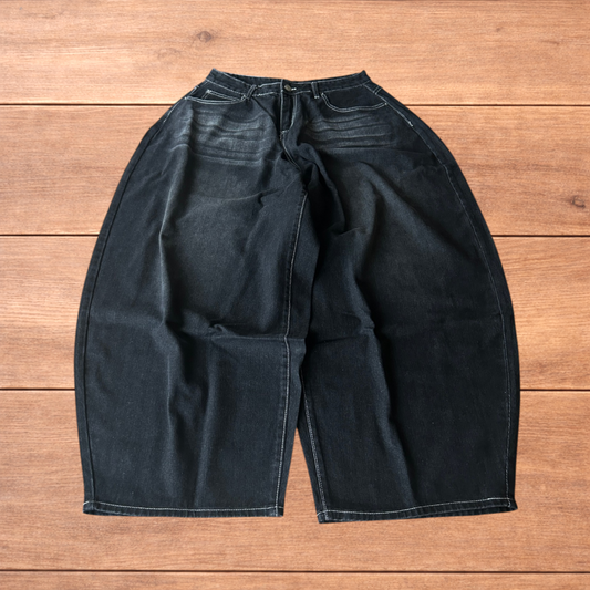 Super baggy wide leg balloon fit jeans in washed black.