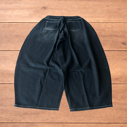 Super baggy wide leg balloon fit jeans in washed black.