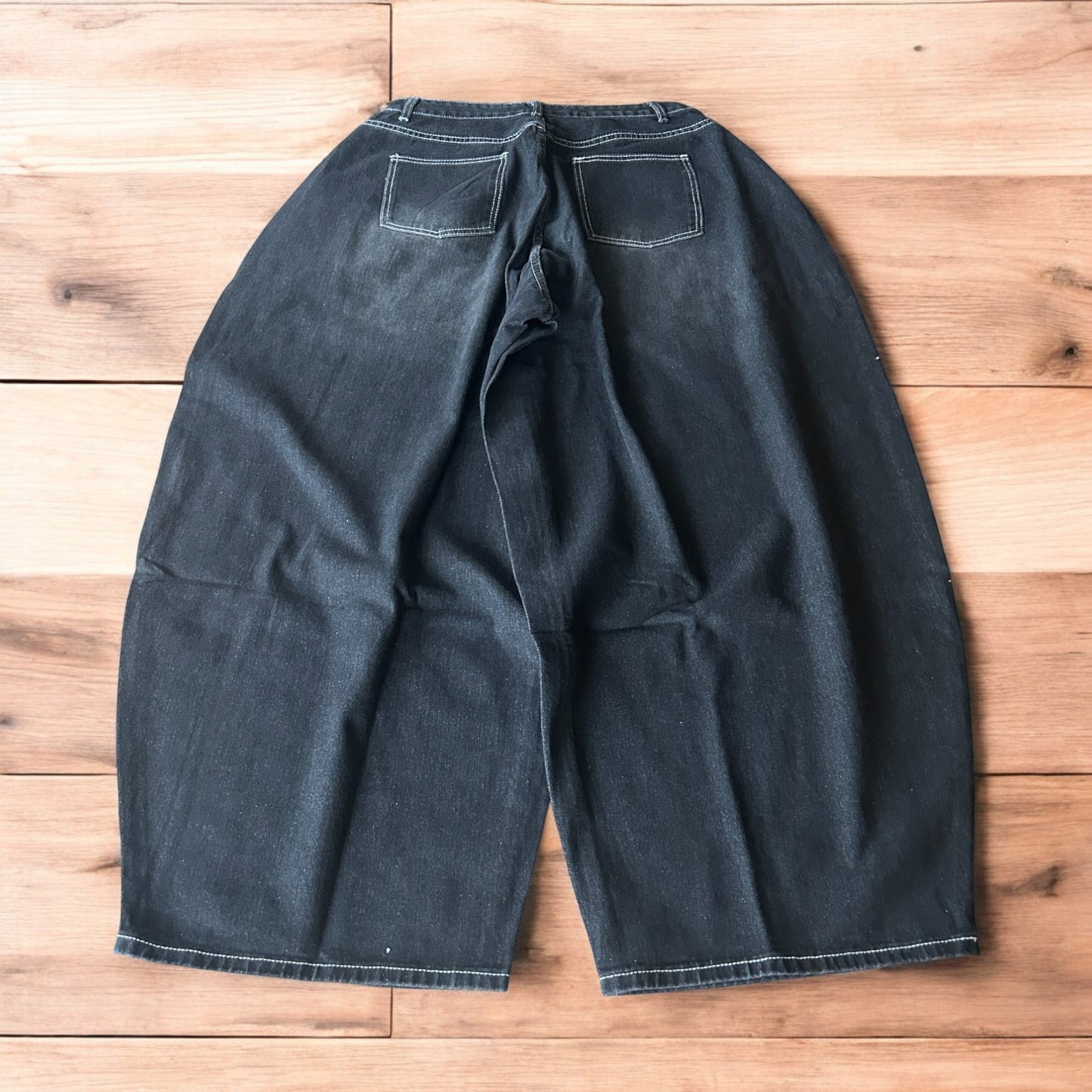 Super baggy wide leg balloon fit jeans in washed black.
