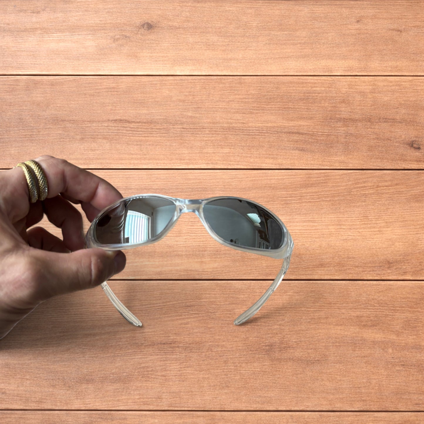 Insane mirrored sunglasses in clear frame with silver lense.