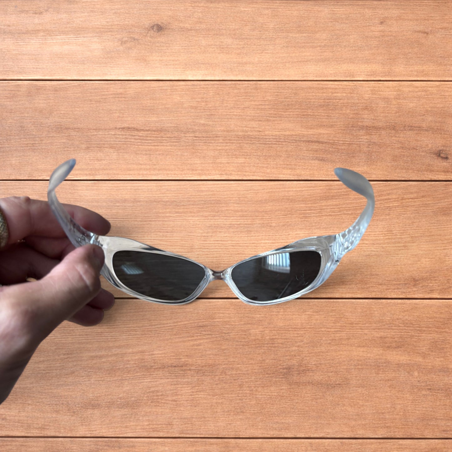 Insane mirrored sunglasses in clear frame with silver lense.