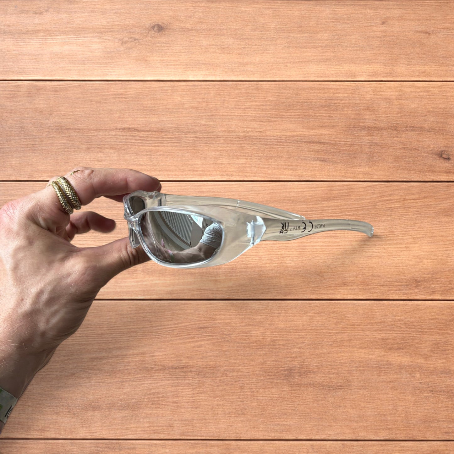Insane mirrored sunglasses in clear frame with silver lense.