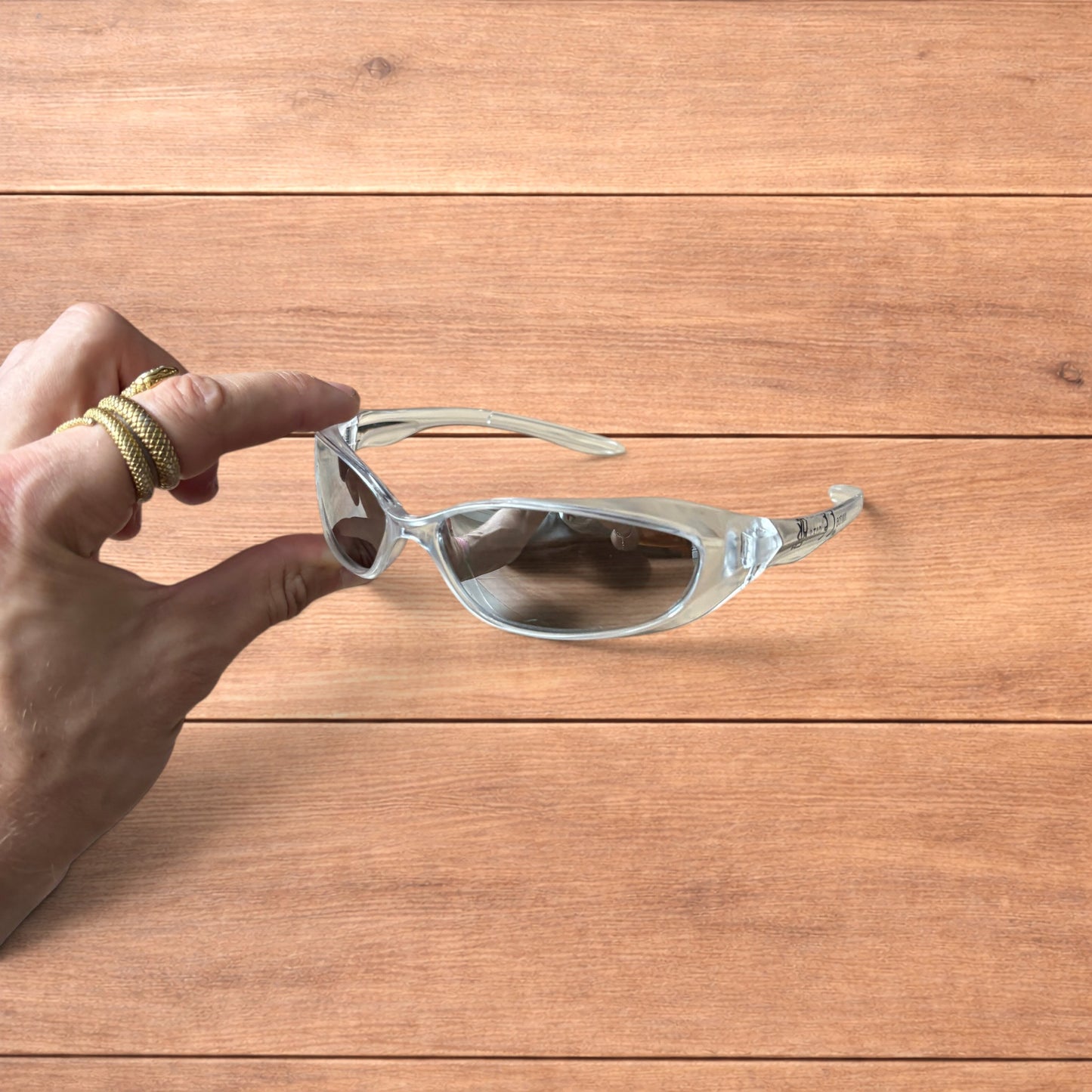 Insane mirrored sunglasses in clear frame with silver lense.
