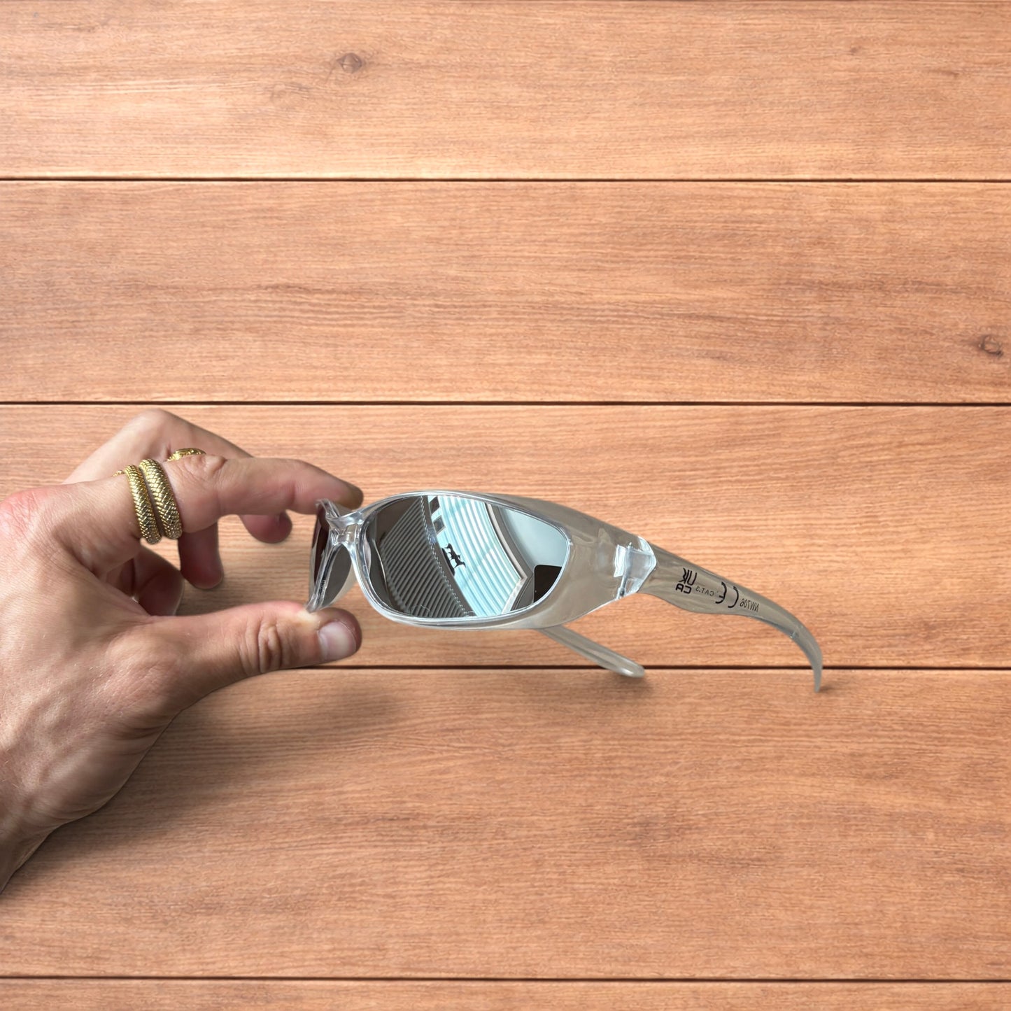 Insane mirrored sunglasses in clear frame with silver lense.