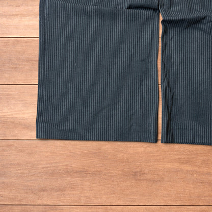 Vintage style baggy wide leg pinstripe tailored trousers in charcoal grey.
