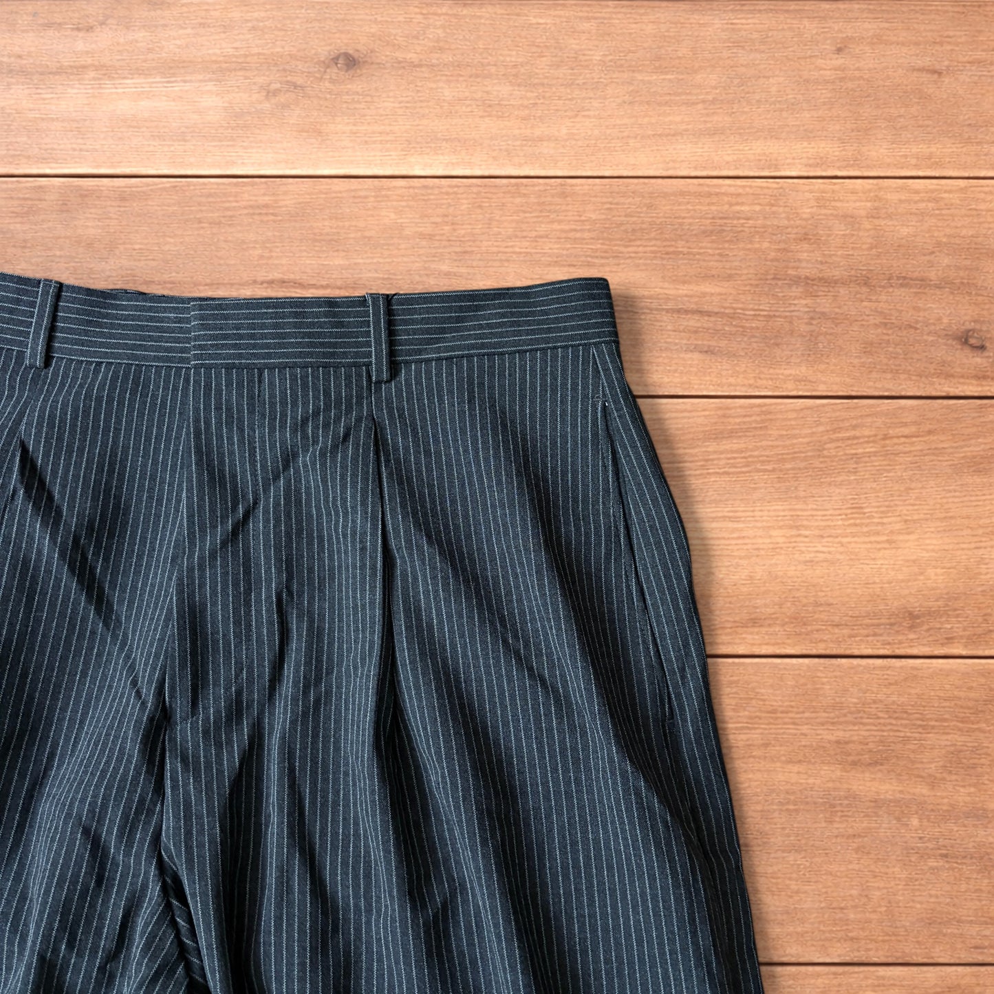 Vintage style baggy wide leg pinstripe tailored trousers in charcoal grey.