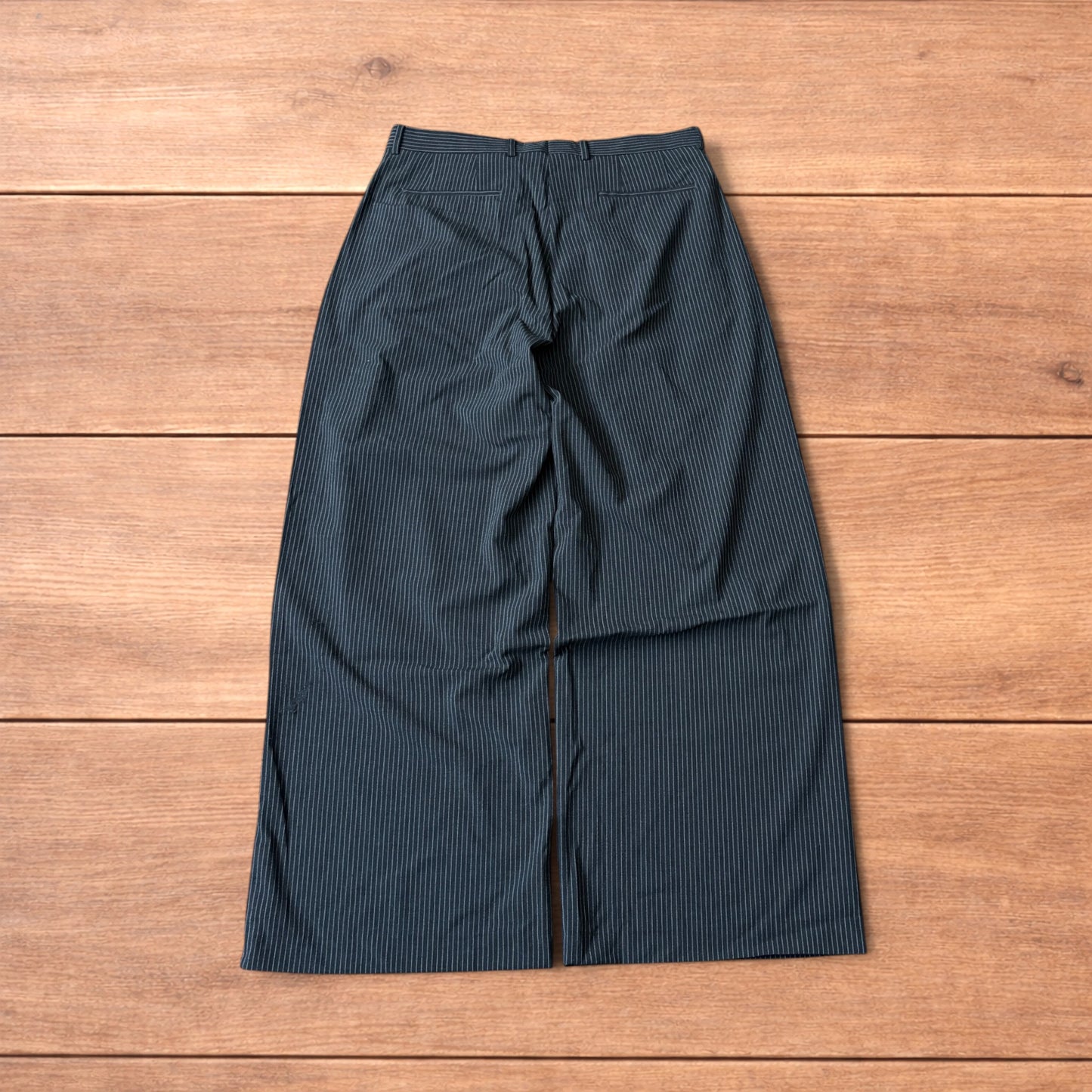 Vintage style baggy wide leg pinstripe tailored trousers in charcoal grey.