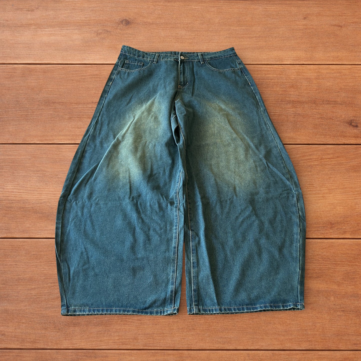Vintage style baggy wide leg skater fit jeans with green fade in dark blue.