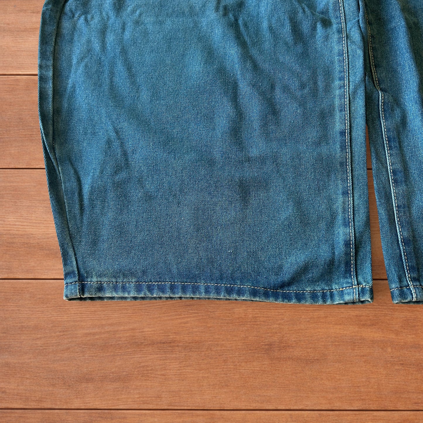 Vintage style baggy wide leg skater fit jeans with green fade in dark blue.