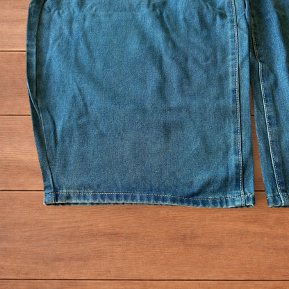 Vintage style baggy wide leg skater fit jeans with green fade in dark blue.
