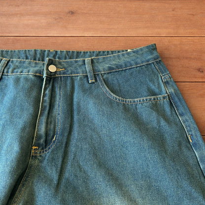 Vintage style baggy wide leg skater fit jeans with green fade in dark blue.