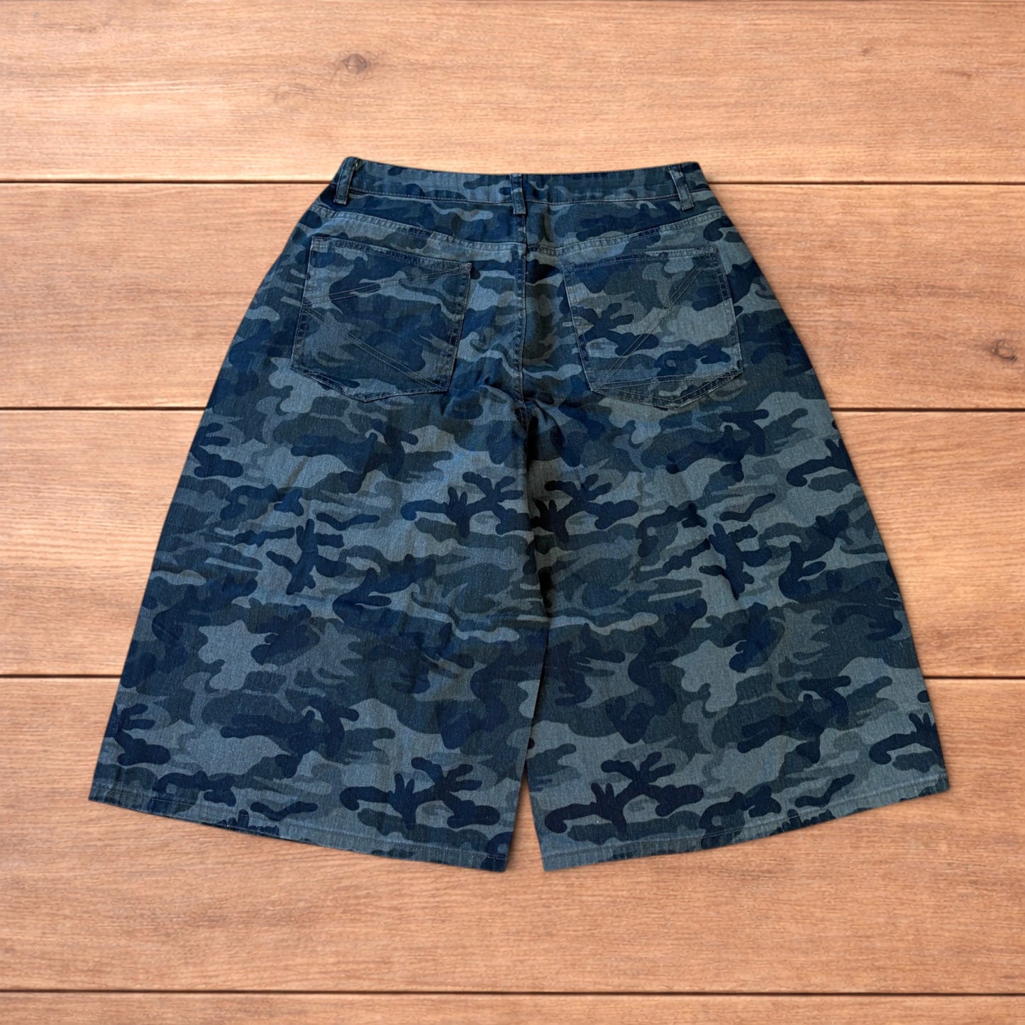 Super baggy wide leg cargo shorts jorts in army camo.