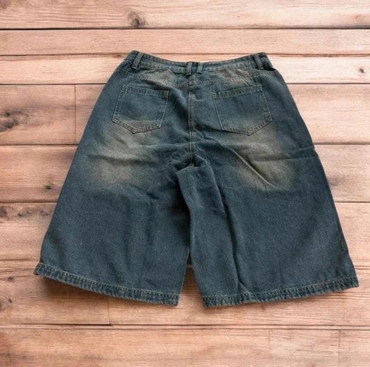 Incredible super baggy wide leg denim carpenter shorts jorts in dark blue wash.