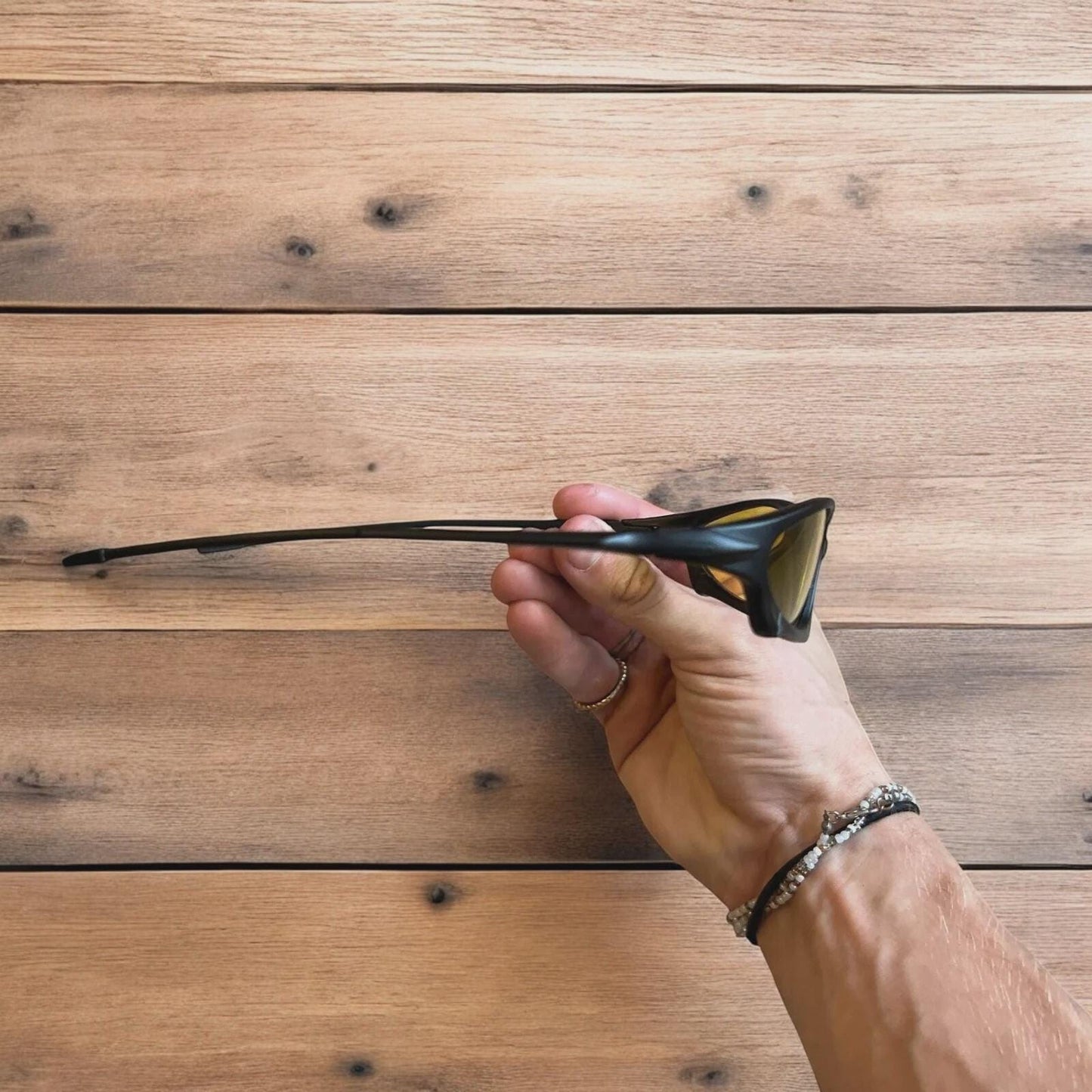 Insane polarised sunglasses in black with yellow lense. One size.