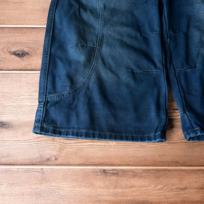 Incredible super baggy wide leg denim carpenter shorts jorts in dark blue wash.