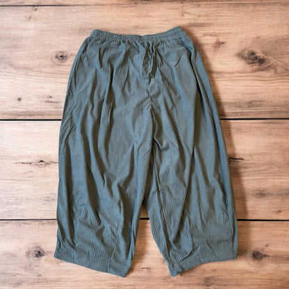 Super baggy wide leg relaxed fit corduroy trousers joggers in grey.