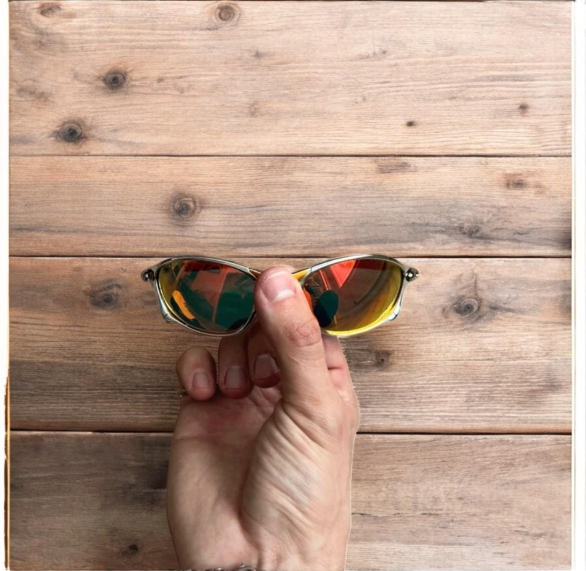 Insane metal frame sunglasses in silver with orange lense. One size.
