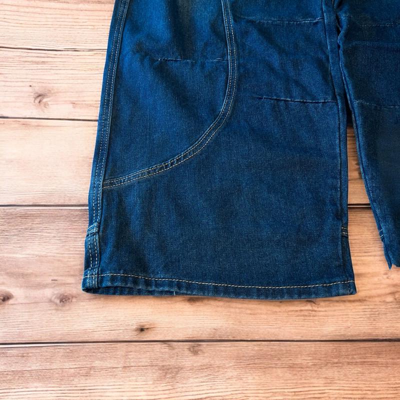 Incredible vintage style baggy wide leg skater fit jeans with fade in dark blue.