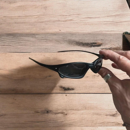Insane polarised sunglasses in black with black lense. One size.