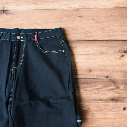 Insane baggy relaxed fit jeans washed black with red embroidery.