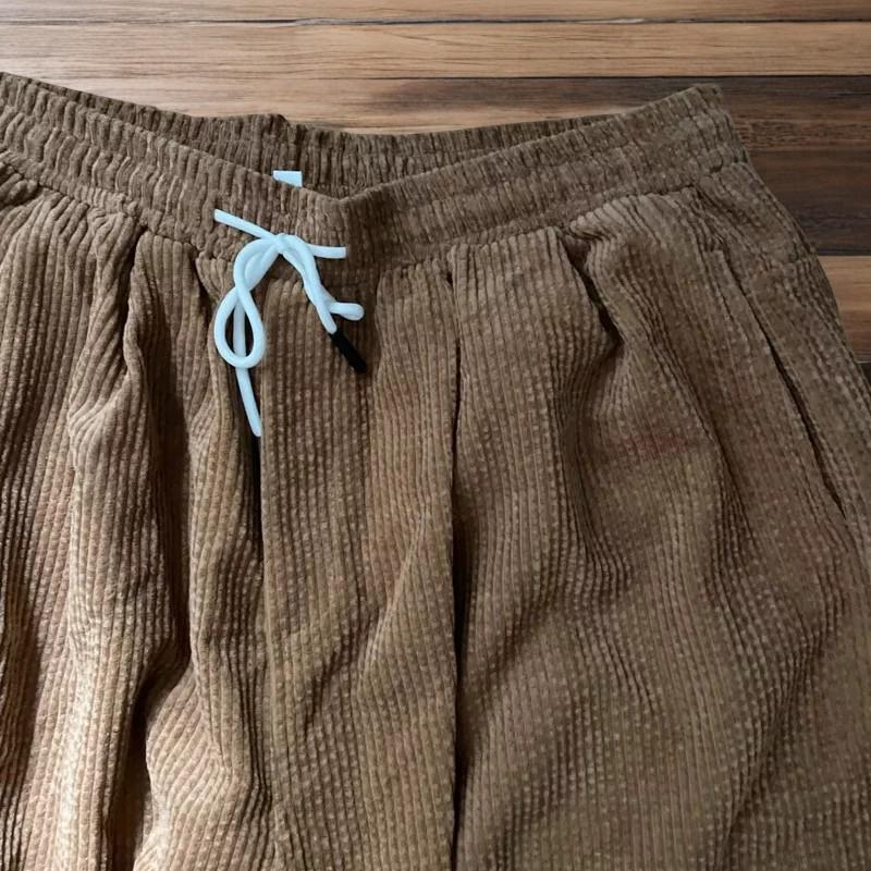 Super baggy wide leg skater corduroy trousers in beige.