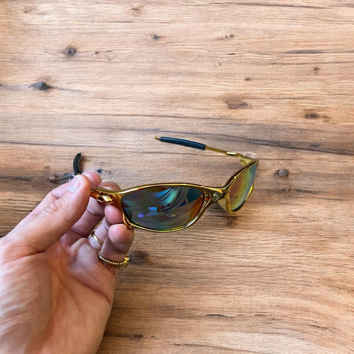 Insane metal frame sunglasses in gold with multicolour rainbow lense. One size.