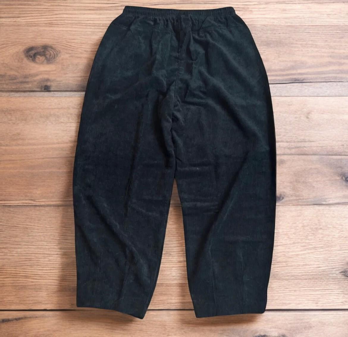 Super baggy wide leg skater corduroy trousers in black.