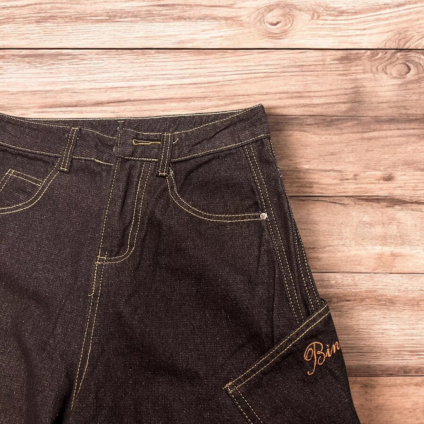 Incredible vintage style baggy wide leg skater fit jeans with embroidery in mid black.