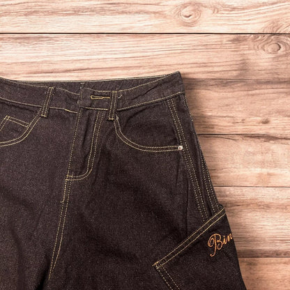 Incredible vintage style baggy wide leg skater fit jeans with embroidery in mid black.