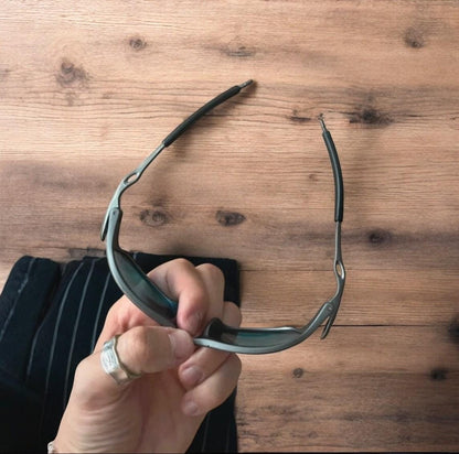 Insane metal frame sunglasses in black with red lense. One size.