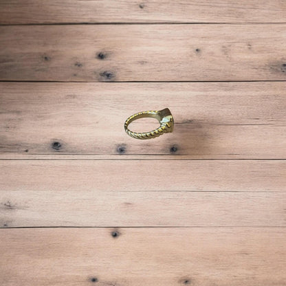 Lovely vintage style gold ring with black gemstone.